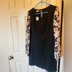Beautiful new dress-size XS but fits like a small